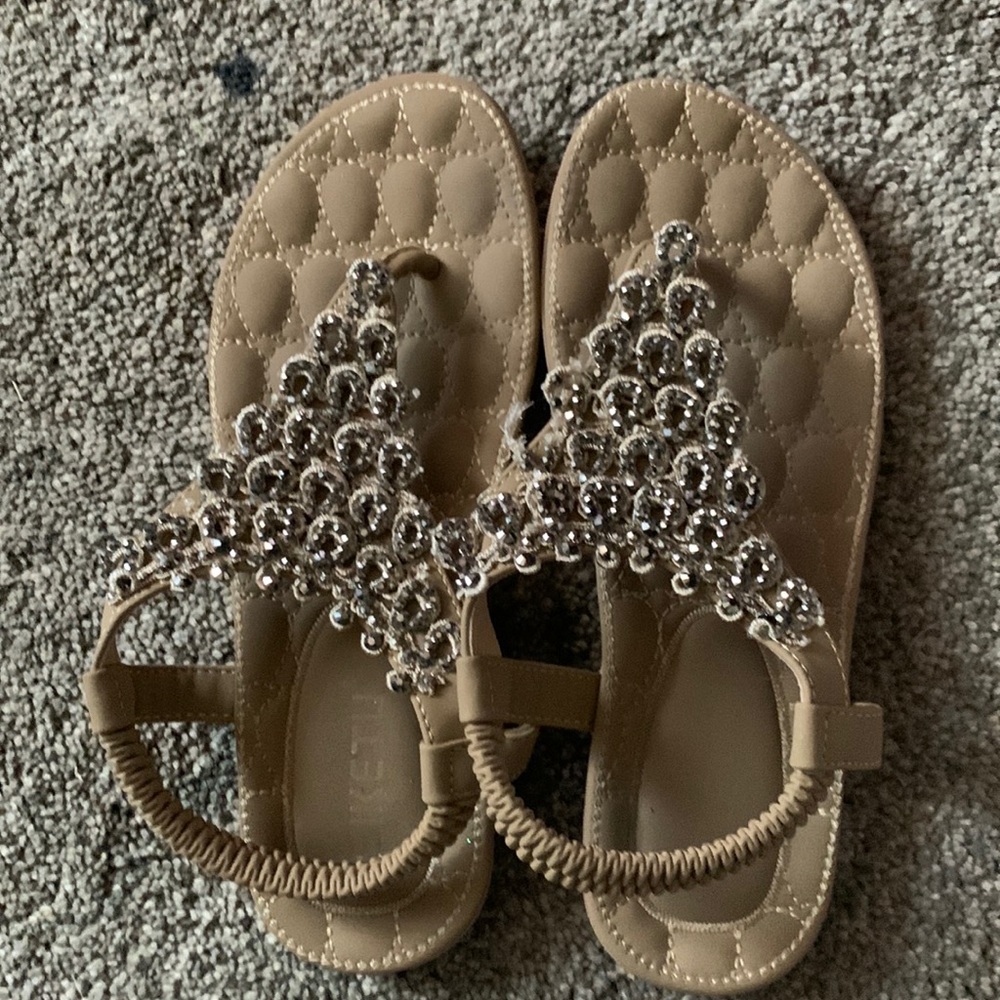 wore one time. one diamond missing.